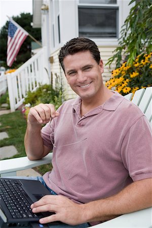 Man Using Laptop Outdoors Stock Photo - Rights-Managed, Code: 700-00623008