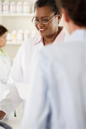 Pharmacist and Patient Stock Photo - Rights-Managed, Code: 700-00623138