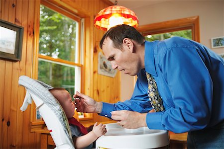 father kitchen feeding baby boy - Father Feeding Baby Stock Photo - Rights-Managed, Code: 700-00623206