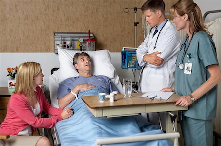simsearch:640-03261406,k - Wife Visiting Husband in Hospital Stock Photo - Rights-Managed, Code: 700-00623296