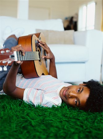 simsearch:400-04921650,k - Boy Playing Guitar Stock Photo - Rights-Managed, Code: 700-00623360