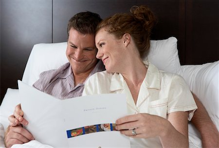 simsearch:700-00635374,k - Couple Looking at Room Service Menu Stock Photo - Rights-Managed, Code: 700-00635367