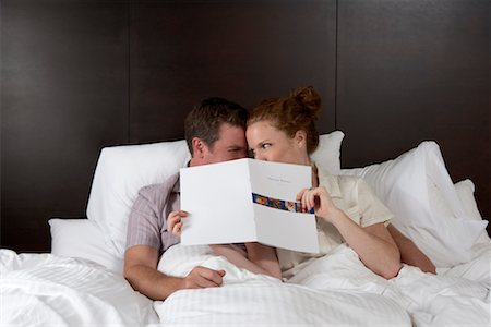 simsearch:700-00635374,k - Couple Looking at Room Service Menu Stock Photo - Rights-Managed, Code: 700-00635369