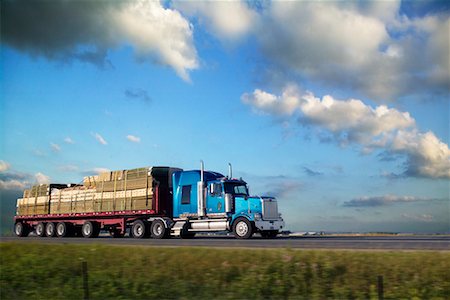 semi truck and highway and field - Transport Truck Stock Photo - Rights-Managed, Code: 700-00635435