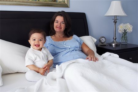 filipino family portrait - Mother and Daughter in Bed Stock Photo - Rights-Managed, Code: 700-00635518