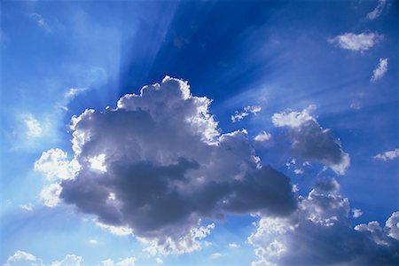Sun Shining Behind Clouds Stock Photo - Rights-Managed, Code: 700-00635568