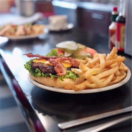 plate of hamburger and fries - Hamburger at Diner Stock Photo - Rights-Managed, Code: 700-00635845