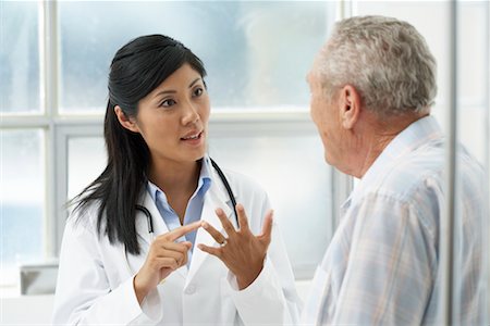 simsearch:600-03405633,k - Doctor with Patient Stock Photo - Rights-Managed, Code: 700-00639415