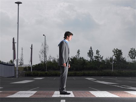 pedestrian side - Businessman Standing in Parking Lot Stock Photo - Rights-Managed, Code: 700-00644007