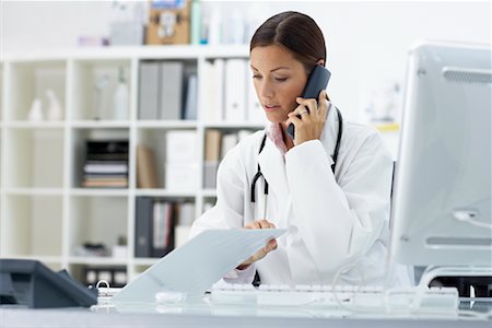 simsearch:700-00641875,k - Doctor on Phone in Office Stock Photo - Rights-Managed, Code: 700-00644239