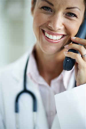 Doctor Using Phone Stock Photo - Rights-Managed, Code: 700-00644276