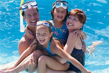 family masks - Family in Pool Stock Photo - Rights-Managed, Code: 700-00641249