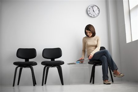 simsearch:700-01459203,k - Woman Sitting in Waiting Area Stock Photo - Rights-Managed, Code: 700-00641895