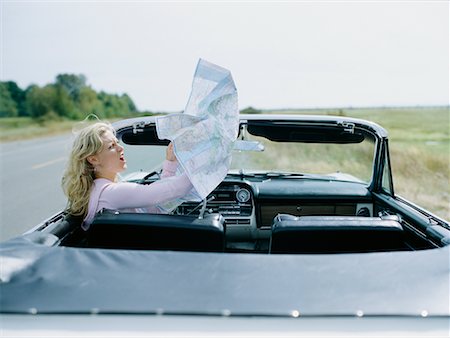 simsearch:700-02200672,k - Woman Looking at Map in Car Stock Photo - Rights-Managed, Code: 700-00642432