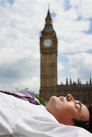simsearch:700-00611221,k - Businessman Lying Down Stock Photo - Rights-Managed, Code: 700-00659378