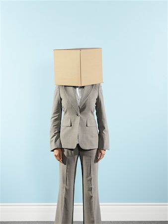 pensées au delà du réel - Femme d'affaires portant une boîte en carton sur la tête Photographie de stock - Rights-Managed, Code: 700-00659409