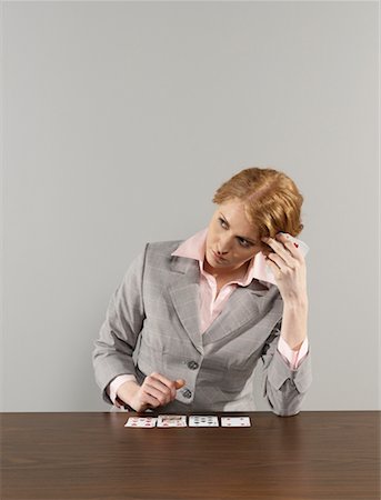 solitaire - Portrait of Businesswoman Playing Solitaire Stock Photo - Rights-Managed, Code: 700-00659432