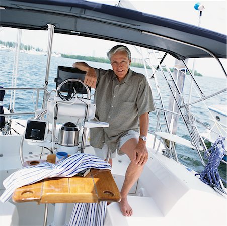 raoul minsart portrait mature - Portrait of Man in Boat Stock Photo - Rights-Managed, Code: 700-00650034