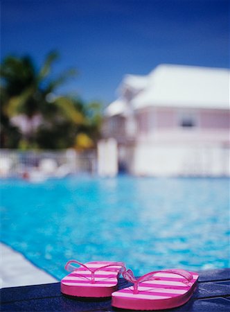 swimming pool still life nobody - Flip Flops by Pool Stock Photo - Rights-Managed, Code: 700-00651183