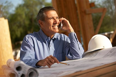 Construction Worker with Cellular Phone Stock Photo - Rights-Managed, Code: 700-00651204