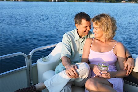 Couple Sitting in Boat Stock Photo - Rights-Managed, Code: 700-00651334