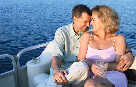 Couple Sitting in Boat Stock Photo - Rights-Managed, Code: 700-00651335