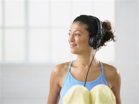 Woman Wearing Headphones Foto de stock - Con derechos protegidos, Código: 700-00651472