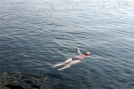 Woman Floating in Lake Stock Photo - Rights-Managed, Code: 700-00651507