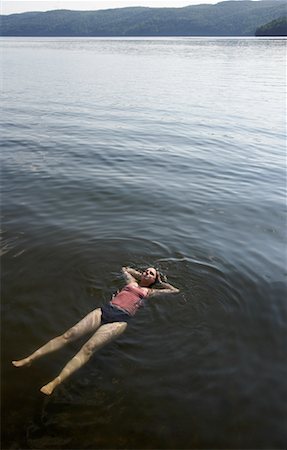 Woman Floating in Lake Stock Photo - Rights-Managed, Code: 700-00651508