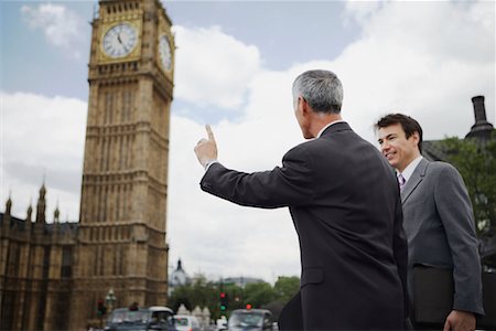 people waving at sky city - Businessmen Hailing Taxi, London, England Stock Photo - Rights-Managed, Code: 700-00651758
