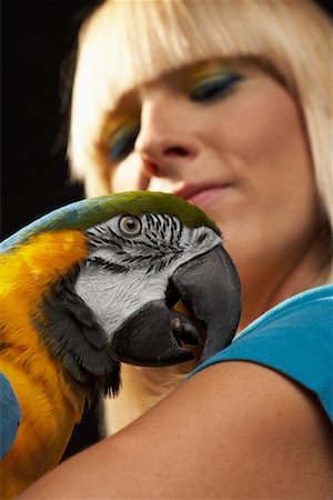 Woman with Blue and Yellow Macaw Foto de stock - Con derechos protegidos, Código: 700-00678817