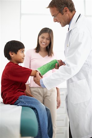 Boy with Cast at Doctor's Office Stock Photo - Rights-Managed, Code: 700-00678838