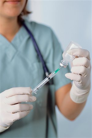 doctor preparing shot - Doctor Using Needle Stock Photo - Rights-Managed, Code: 700-00678858
