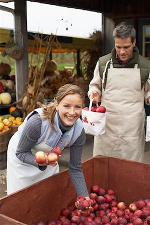 Couple Working at Farmer's Market Stock Photo - Rights-Managed, Code: 700-00684843