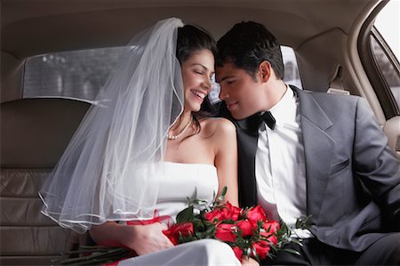 Newlyweds in Limousine Stock Photo - Rights-Managed, Code: 700-00684980