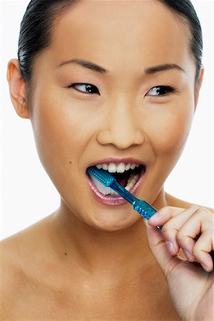 simsearch:700-00527879,k - Woman Brushing Teeth Stock Photo - Rights-Managed, Code: 700-00688416