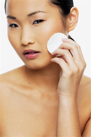 simsearch:700-01163584,k - Woman Using Acne Pad Stock Photo - Rights-Managed, Code: 700-00688421