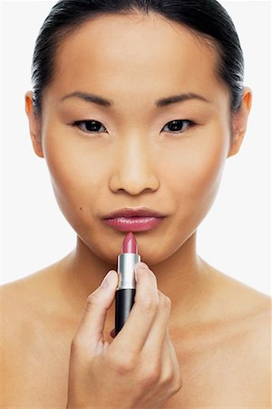 simsearch:700-01586129,k - Woman Applying Lipstick Stock Photo - Rights-Managed, Code: 700-00688422