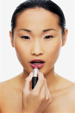 simsearch:700-01586129,k - Woman Applying Lipstick Stock Photo - Rights-Managed, Code: 700-00688423