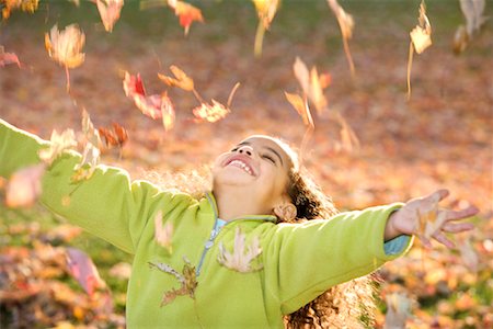 Girl Playing with Fall Leaves Stock Photo - Rights-Managed, Code: 700-00688586