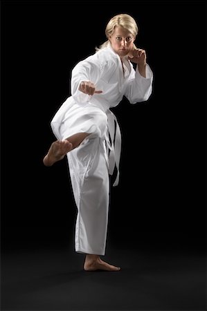 female martial arts poses - Woman in Fighting Pose Stock Photo - Rights-Managed, Code: 700-00688658