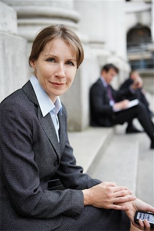 simsearch:700-00681235,k - Businesswoman Sitting On Steps Of Building Stock Photo - Rights-Managed, Code: 700-00680929