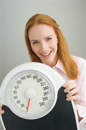 pale redheads - Portrait of Woman Holding Scale Stock Photo - Rights-Managed, Code: 700-00681259