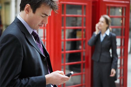 english phone box - Business People Using Cellular Telephones, London, England Stock Photo - Rights-Managed, Code: 700-00681335