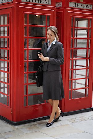 english phone box - Businesswoman Using Cellular Telephone, London, England Stock Photo - Rights-Managed, Code: 700-00681331
