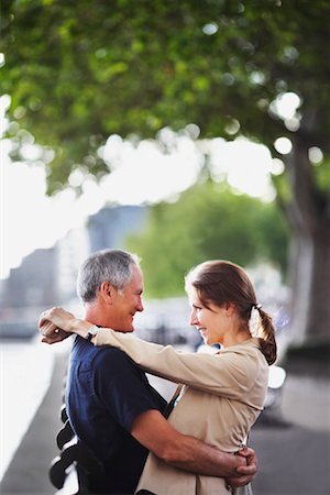 simsearch:700-00681496,k - Couple Hugging in City Park London, England Stock Photo - Rights-Managed, Code: 700-00681497