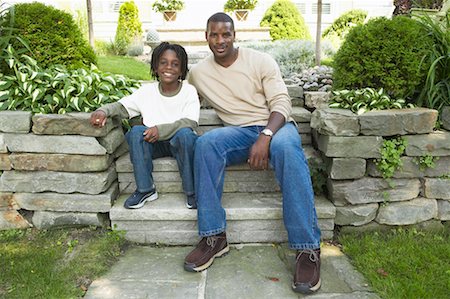 Père et fils assis sur les marches Photographie de stock - Rights-Managed, Code: 700-00681543