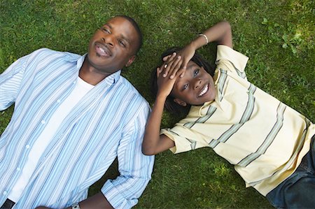 Father and Son Lying On The Grass Stock Photo - Rights-Managed, Code: 700-00681577