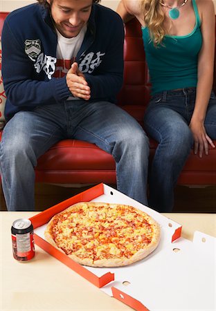 dinner on the couch - Couple About to Eat Pizza Stock Photo - Rights-Managed, Code: 700-00683308