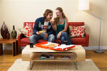 dinner on the couch - Couple Eating Pizza Stock Photo - Rights-Managed, Code: 700-00683310